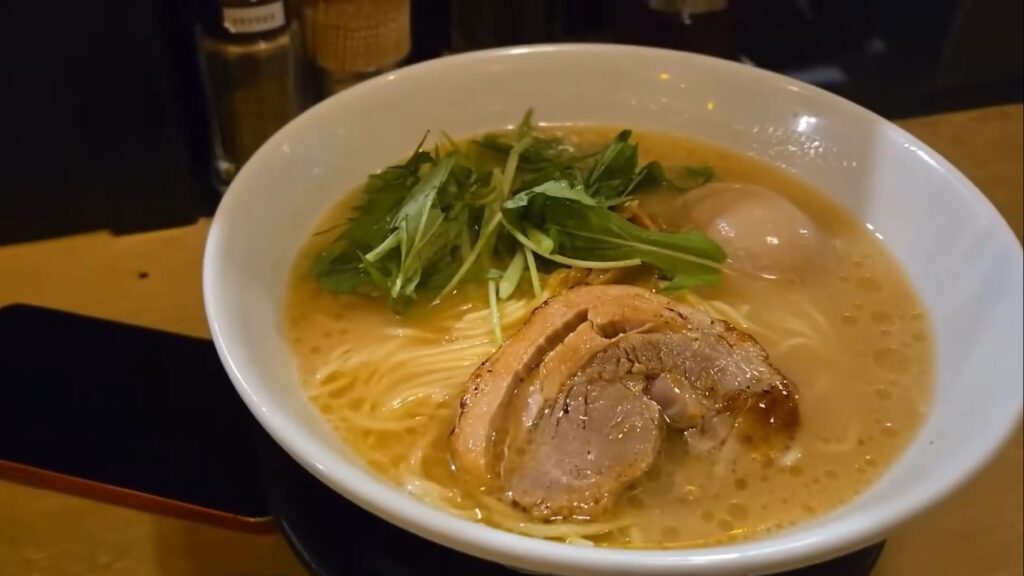 A bowl od paitan ramen by Chommage Shokudo.