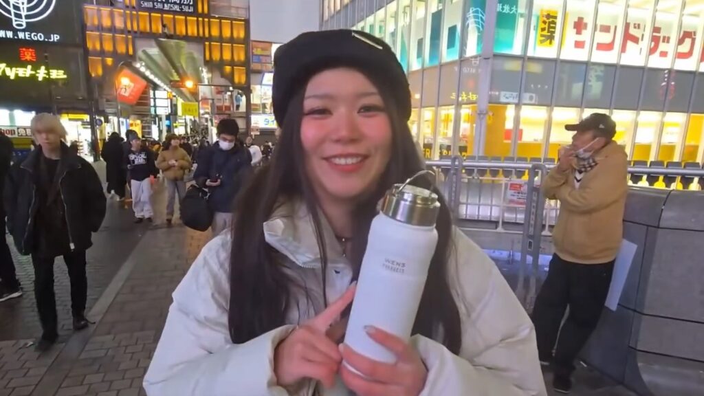 Hazu holding up the water bottle she got for Christmas.